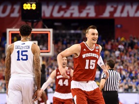 Wisconsin Badgers forward Sam Dekker (15) celebrates after his team defeated the Kentucky Wildcats in the NCAA semifinals on April 4. (USA Today Sports)