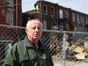 A strip of historic downtown Whitby was forever altered when flames ripped through a century-old building on Good Friday. David Chambers, president of the Whitby Historical Society, says it will be a real loss to the town if the building, constructed in 1878, cannot be saved. (CHRIS DOUCETTE/Toronto Sun)