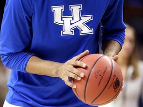 A Kentucky Wildcats player warms up prior to the game against the West Virginia Mountaineers during the Midwest Regional semifinal of the 2015 NCAA Men's Basketball Tournament at Quicken Loans Arena on March 26, 2015 in Cleveland, Ohio.  Andy Lyons/Getty Images/AFP