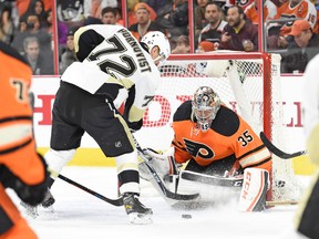 Philadelphia Flyers goalie Steve Mason (35) makes a save against Penguins' Patrick Hornqvist during the first period at Wells Fargo Center Saturday night. Eric Hartline-USA TODAY Sports