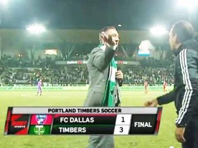 Portland Timbers coach Caleb Porter throws a piece of tissue at FC Dallas manager Oscar Pareja.