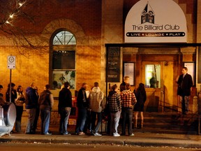 Patrons wait to be allowed into a The Billiard Club in Old Strathcona along Whyte Ave., in Edmonton. Photo Courtesy/Responsible Hospitality Edmonton