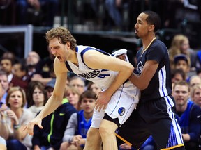 Golden State Warriors guard Shaun Livingston (34) is called for a flagrant foul against Dallas Mavericks forward Dirk Nowitzki (41) during the second half at American Airlines Center. (Kevin Jairaj-USA TODAY Sports)