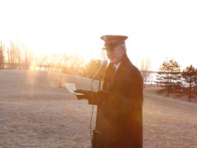 Maj. Wil Brown-Ratcliffe  leads worship during  the Salvation Army Esater Sunrise Service on Sunday. Worshipper Don Reid said it was the first time he has seen the sun rise at the annual service celebrating what Brown-Ratcliffe calls the ‘holiest day on the Christian calendar’.