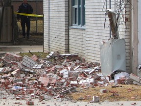 Bricks fell to the ground from a TCHC building at  at 3171 Eglinton Ave. E., just east of Markham Rd. (CHRIS DOUCETTE, Toronto Sun)