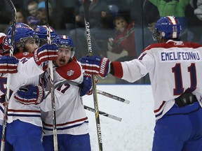 Kingston Voyageurs players celebrate their first goal of the game against the Trenton Golden Hawks during Game 6 of the Ontario Junior Hockey League North-East Conference final at the Invista Centre on Sunday. (Ian MacAlpine/The Whig-Standard)