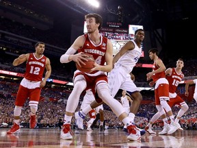Wisconsin Badgers’ Frank Kaminsky handles the ball against the Kentucky Wildcats on Saturday night. In their one meeting this season, Duke beat Wisconsin. (afp)