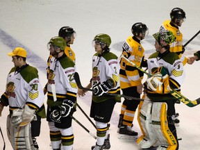 Members of the North Bay Battalion shake hands with members of the Kingston Frontenacs after North Bay's win in Game 4 of their playoff series at the Rogers K-Rock Centre. North Bay won the Eastern Conference quarter-final series in four straight games. (Annie Sakkab/For The Whig-Standard)