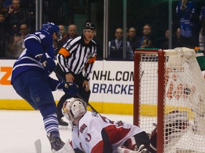 Maple Leafs centre Peter Holland scores the shootout winner against Andrew Hammond of the Senators on Sunday night at the Air Canada Centre. (Jack Boland/Toronto Sun)
