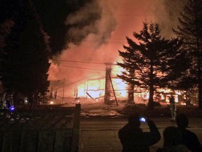 An early-morning fire Monday destroyed a house along Page Rd., in Orleans. (Submitted image Matt MacMartin @MMacMartin613 via Twitter)