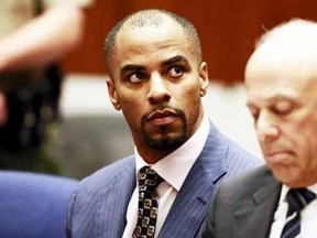 Former National Football League star Darren Sharper (L) and his attorney Leonard Levine (R) appear at the Clara Shortridge Foltz Criminal Justice Center in Los Angeles, California March 23, 2015. (REUTERS/Nick Ut/Pool)