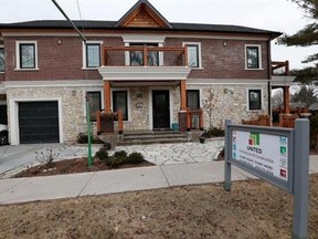 Police are investigating a suspect arson and home invasion at this Rathburn Rd. home. (MICHAEL PEAKE/Toronto Sun)