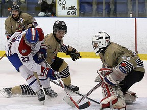 Action around the TGH net during OJHL playoff action Sunday in Kingston. (Whig Standard photo)