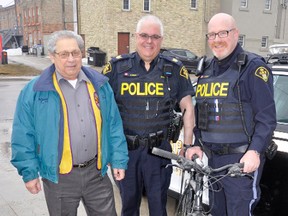 The Mitchell Lions Club is working with the Municipality of West Perth and the Perth County OPP, Mitchell detachment for the Cycle Recycle program this year. From left are Mitchell Lions Club member Ray McNaught, Sgt. Manny Cohelo and Const. Shawn McFalls. The project aims to recycle used or abandoned bicycles and send them to a developing country, where they can be used to help people become more independent and improve their lives. KRISTINE JEAN/MITCHELL ADVOCATE