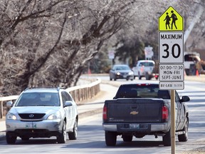 Traffic moves through a school zone in Winnipeg. (Brian Donogh/Winnipeg Sun)