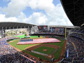 Marlins Park ahead of the season opener between the Braves and the Marlins in Miami on Monday, April 6, 2015. Although the stadium has a retractable roof, rain would halt the game in the bottom of the second inning for 16 minutes. (Steve Mitchell/USA TODAY Sports)