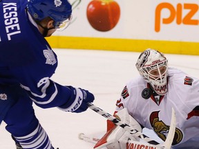 Ottawa Senators Andrew Hammond (30) robs Toronto Maple Leafs Phil Kessel (81) in the third period in Toronto on Sunday April 5, 2015. Jack Boland/Toronto Sun/QMI Agency