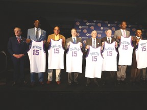 From left, Spencer Haywood, George Raveling, John Calipari, Dick Bavetta, Louis Dampier, Dikembe Mutombo and Jo Jo White were announced as this year’s additions to the Naismith Memorial Basketball Hall of Fame yesterday in Indianapolis. (AFP)