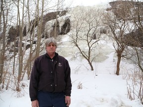 Rick Ruel, of Mountain Street, is concerned about the possibility of flooding on his street from the ice build up on a mountain behind his home. John Lappa/Sudbury Star