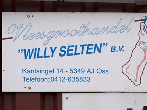 A sign for wholesaler Vleesgroothandel Willy Selten B.V. , is seen in Oss April 11, 2013. 
REUTERS/Bart Maat