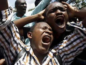 Kenyan university students participate in a demonstration against an attack by gunmen at the Garissa University College campus, along the streets of the capital Nairobi, April 7, 2015. (REUTERS/Thomas Mukoya)