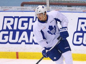 Tyler Bozak carries the puck during Leafs practice at the MasterCard Centre in Toronto on Tuesday April 7, 2015. Dave Abel/Toronto Sun