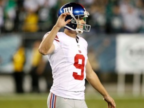 New York Giants kicker Lawrence Tynes reacts after missing a field goal attempt against the Philadelphia Eagles during the fourth quarter of their NFL football game in Philadelphia, Pennsylvania, September 30, 2012. (REUTERS/Tim Shaffer)