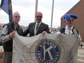 George Service, president of the Chatham-Kent Kiwanis Club, Mayor Randy Hope and CK town crier George Sims officially open the 70th Annual Kiwanis Music Festival with a flag raising ceremony Tuesday at the Civic Centre.
(Blair Andrews/Chatham This Week)