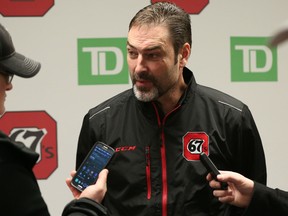 Ottawa 67's head coach Jeff Brown speaks to the media Tuesday at TD Place as players cleaned out their lockers after being eliminated from the playoffs Sunday. (Chris Hofley/Ottawa Sun)