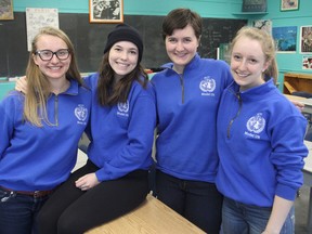KCVI students Sophia Linton, left, Olivia Holden, Alanna Grogan and Alice Soper are helping organize this year's Model United Nations at the school. About 130 students from seven schools are portraying international delegates. (Michael Lea/The Whig-Standard)