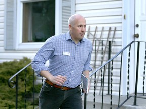 Alberta Party Greg Clark campaigns in the Marda Loop/Knob Hill neighbourhood in southwest Calgary, Alta on Tuesday April 7, 2015.
Jim Wells/Calgary Sun/QMI Agency