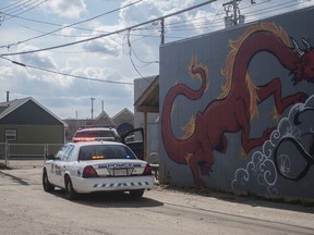 An RCMP cruiser is pictured during a traffic stop in an alleyway in downtown Whitecourt, Alta. on Tuesday April 7, 2015. Police arrested the driver after they discovered there was an outstanding warrant.  

Adam Dietrich | Whitecourt Star