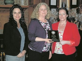 Jessica Laws / The Intelligencer
Lisa Warriner, executive director (left) and Sally Fremr (right) honoured Lee Marchildon (centre) at the 11th annual Volunteer of the Year Award with Victims of Crime and Tragedy for most calls completed.