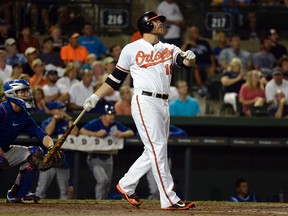 First baseman Chris Davis returned to the Orioles on Tuesday after he finished serving a 25-game suspension on Monday. (Tommy Gilligan/USA TODAY Sports/Files)