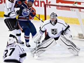 Edmonton’s Derek Roy battles with Los Angeles forward Jeff Carter in front of goalie Martin Jones at Rexall Place on April 8, 2015. Codie McLachlan/Edmonton Sun