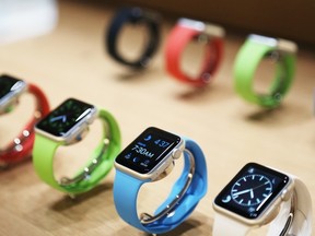Apple Watches are displayed following an Apple event in San Francisco, California in this March 9, 2015 file photo. REUTERS/Robert Galbraith/Files