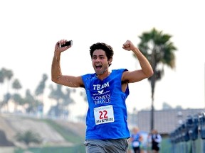 Actor Adrian Grenier of Team Lonely Whale participates in the New Years Resolution - Run A Better Life - 5k, 10k & 15k race on January 18, 2015 in Long Beach, California.   Allen Berezovsky/AFP