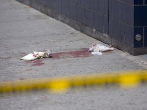 Blood is seen on the sidewalk near the 1 Oak nightclub in New York on April 8, 2015. NBA player Chris Copeland of the Indiana Pacers and his wife were stabbed during a dispute outside a New York City nightclub early on Wednesday and hospitalized with non-life-threatening injuries, according to police and media reports. (REUTERS/Andrew Kelly)
