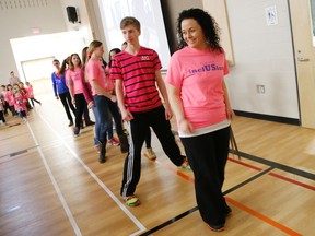 Students and staff at Harmony Public School in Belleville take part in the Pink Shirt Day, April 8, 2015, promoting inclusivity and acceptance.