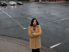 CAA South Central Ontario is seeking public input for its annual worst roads campaign. Caroline Grech, CAA government relations specialist, is pictured here at the intersection of Lacroix and Richmond streets in Chatham, Ont. on Wednesday, April 8, 2015, which she said is trending as the worst roads in Chatham-Kent. She encourages residents to go to CAAWorstRoads.com to vote for what they believe are the worst roads in the municipality. (Ellwood Shreve, The Daily News)