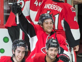 Ottawa Senators  right wing Mark Stone (61) celebrates his overtime goal against the Pittsburgh Penguins  at the Canadian Tire Centre Tuesday, April 7, 2015. (Marc DesRosiers-USA TODAY Sports)