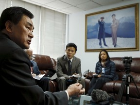 North Korea's new deputy U.N. ambassador An Myong Hun (L) speaks during a news conference in New York April 8, 2015. REUTERS/Eduardo Munoz