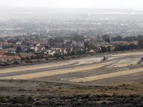 Water collection reservoirs are pictured empty in Palmdale, California April 7, 2015.  REUTERS/Mario Anzuoni