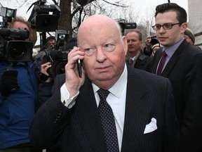 Suspended Senator Mike Duffy leaves the Ottawa courthouse Wednesday, April 8,  2015. Tony Caldwell/Ottawa Sun/QMI Agency