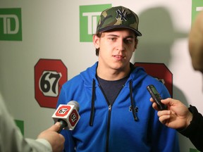 Ottawa 67's captain Travis Konecny speaks to the media at TD Place on Tuesday, April 7, as players cleaned out their lockers after being eliminated from the playoffs Sunday. (Chris Hofley/Ottawa Sun)