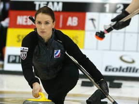 Skip Anna Sidorova delivers a rock during her team’s 7-4 win over Heather Nedohin of Alberta during round-robin play at the Players’ Championship at the Mattamy Athletic Centre on April 8, 2015.