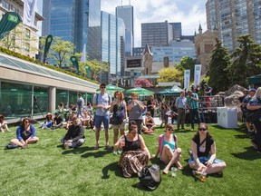 People relax in downtown Toronto, Ont. on Monday May 26, 2014. Ernest Doroszuk/Toronto Sun/QMI Agency