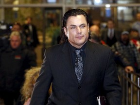 Suspended Senator Patrick Brazeau leaves during a break in his trial for assault and sexual assault at the courthouse in Gatineau, Quebec, March 24, 2015. (REUTERS/Chris Wattie)