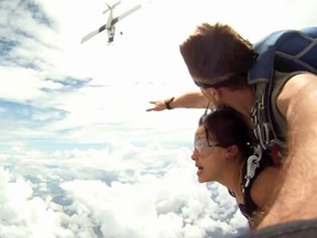 Skydivers narrowly escape being hit by the plane they jumped out of.
(Screenshot from YouTube)