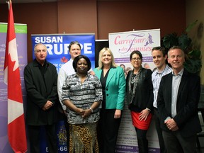 Susan Truppe, Member of Parliament for London North Centre, stands with the recipients of the New Horizons grant funding seniors’ programs April 8. From left to right: Bill Meehan, executive director of Museum London; Chris Harvey, CEO of the Boys and Girls Club of London; Emilie Crakondji, executive director of Carrefour des Femmes; Susan Truppe, MP for London North Centre; Cynthia O’Neil, representative for St. Paul’s Cathedral; Matthew Trinnear, representative for OSGA 55+; and Steve Cordes, executive director of Youth Opportunities Unlimited. MIRANDA BRUMWELL\SPECIAL TO THE LONDONER\QMI AGENCY